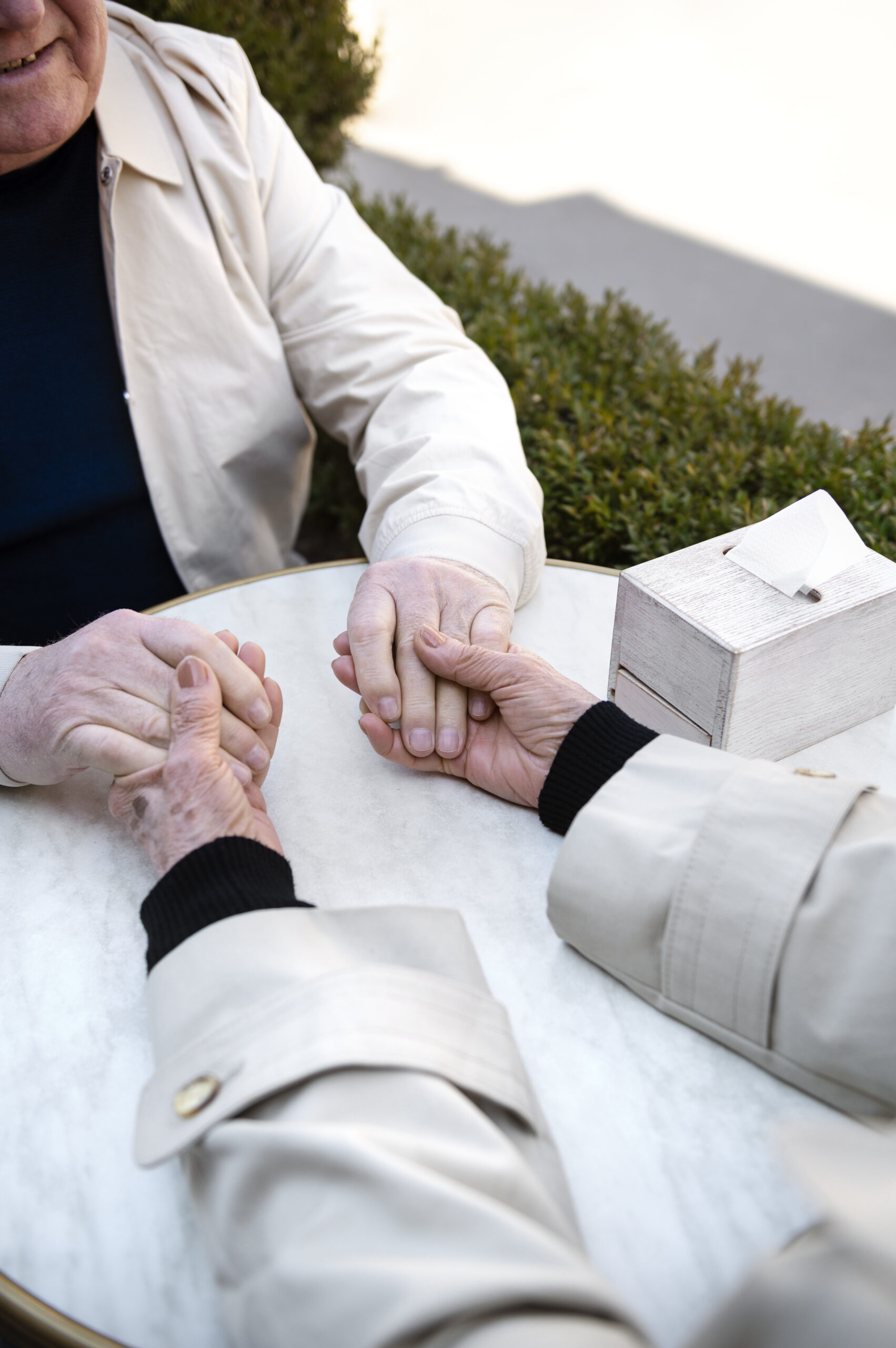 high angle old people holding hands scaled