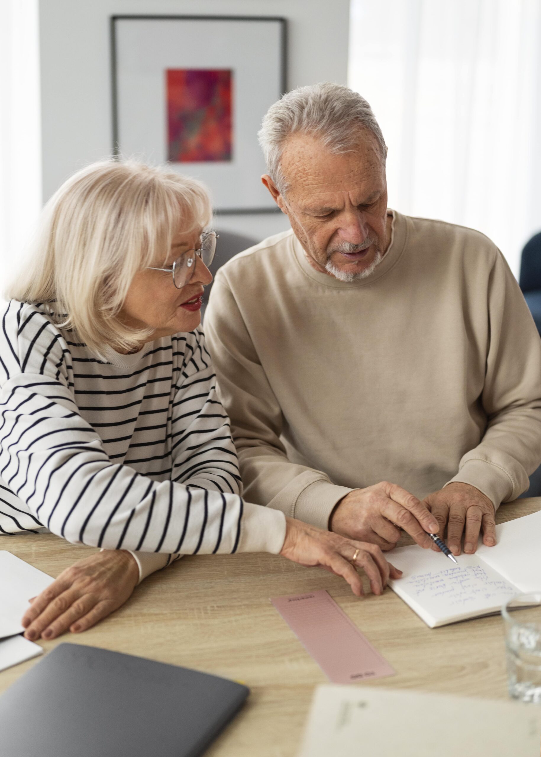 Two people reading documents