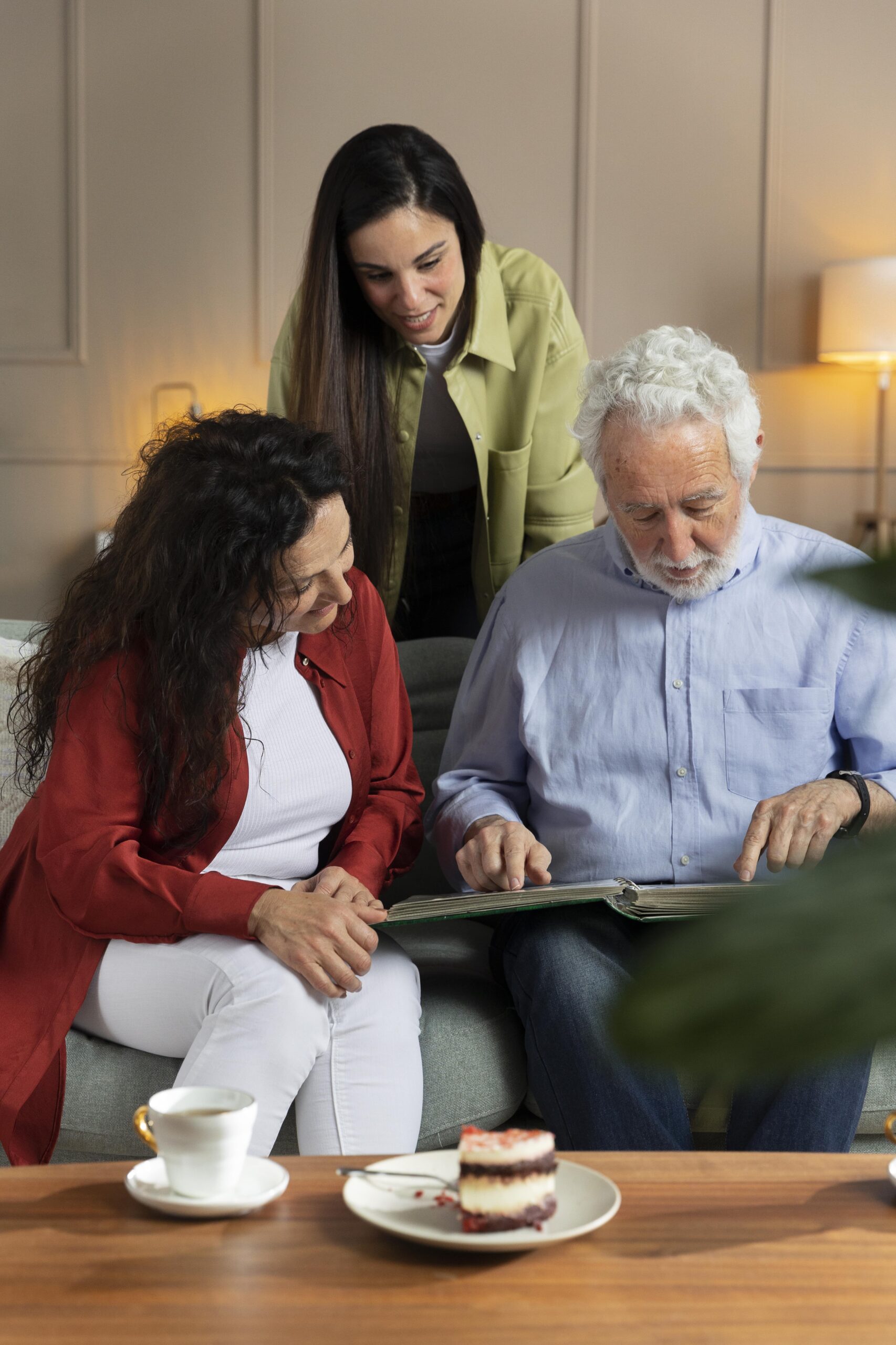 Memory Care 6 Family looking at old picutes