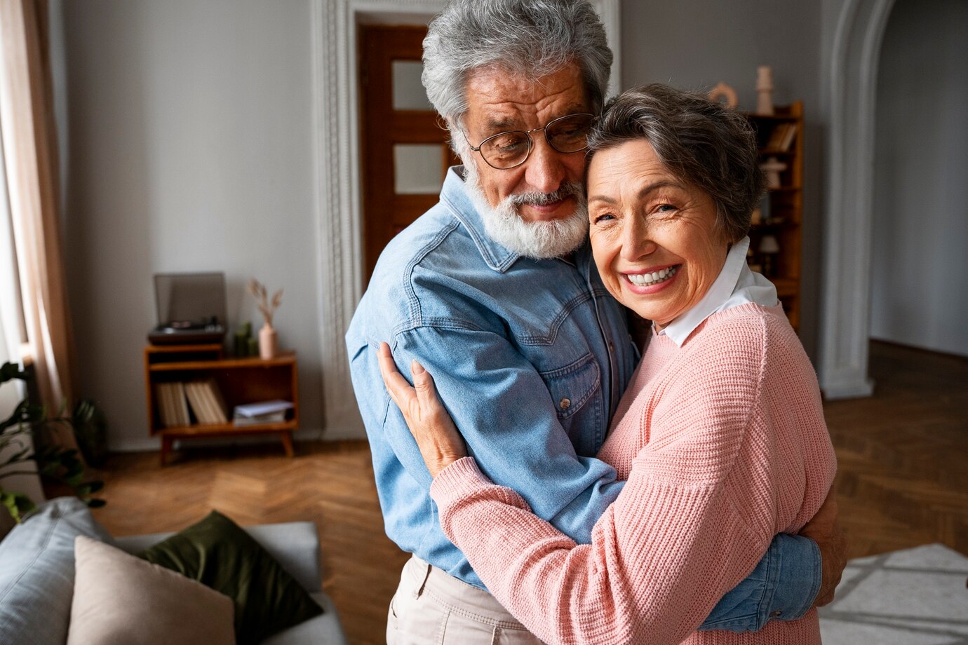 Testimonials 9 smiley couple hugging medium shot 23 2149894091